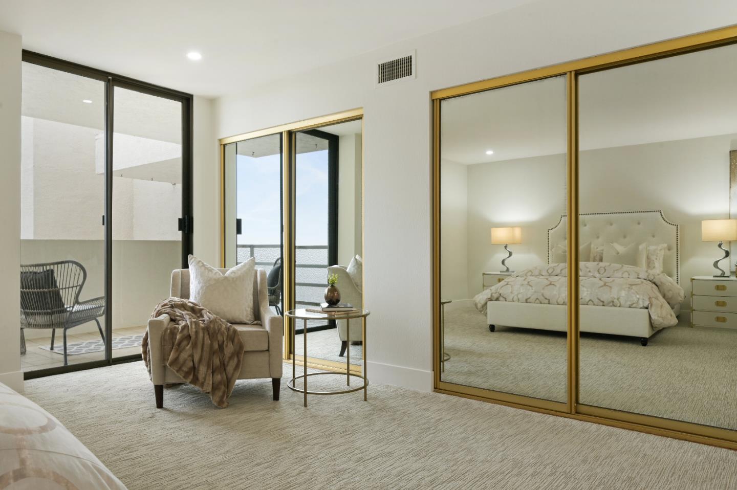 110 Park Road, Unit 502 Burlingame, CA 94010 - Photo 21 of 43 a living room with furniture and a glass door shower