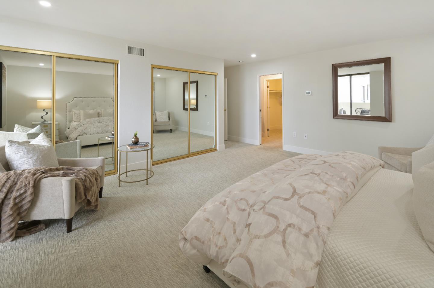 110 Park Road, Unit 502 Burlingame, CA 94010 - Photo 23 of 43 a spacious bedroom with a bed and glass door