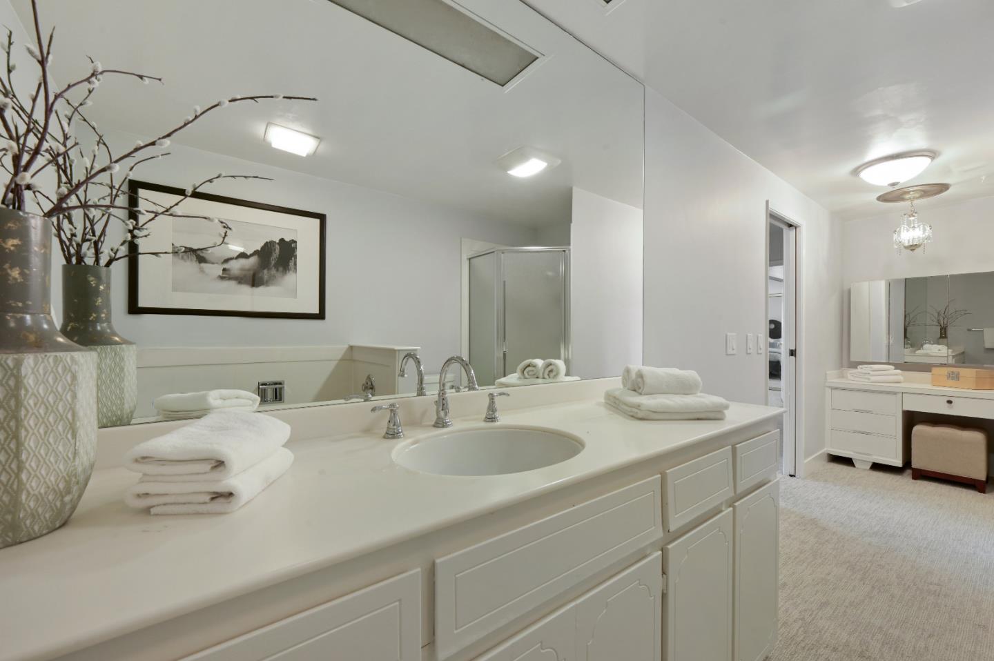 110 Park Road, Unit 502 Burlingame, CA 94010 - Photo 25 of 43 a bathroom with double vanity and a bathtub