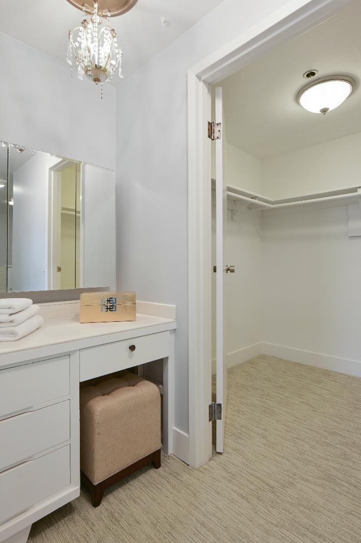 110 Park Road, Unit 502 Burlingame, CA 94010 - Photo 26 of 43 a bathroom with a double vanity sink and a mirror