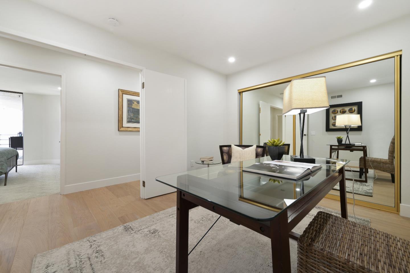 110 Park Road, Unit 502 Burlingame, CA 94010 - Photo 28 of 43 a view of a dining room with a table and chairs