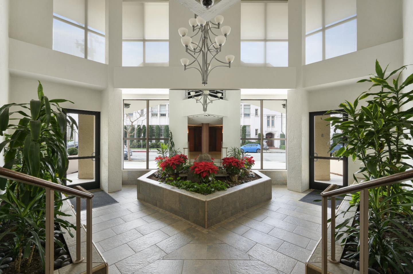 110 Park Road, Unit 502 Burlingame, CA 94010 - Photo 33 of 43 a living room with furniture and a fireplace