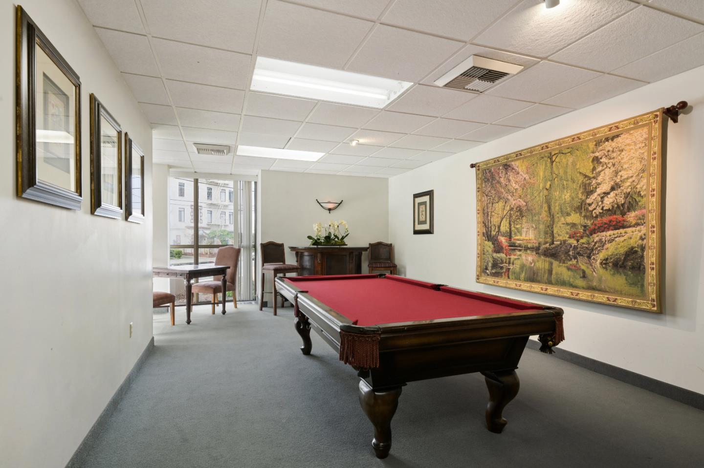 110 Park Road, Unit 502 Burlingame, CA 94010 - Photo 36 of 43 a swimming pool with a large window and furniture
