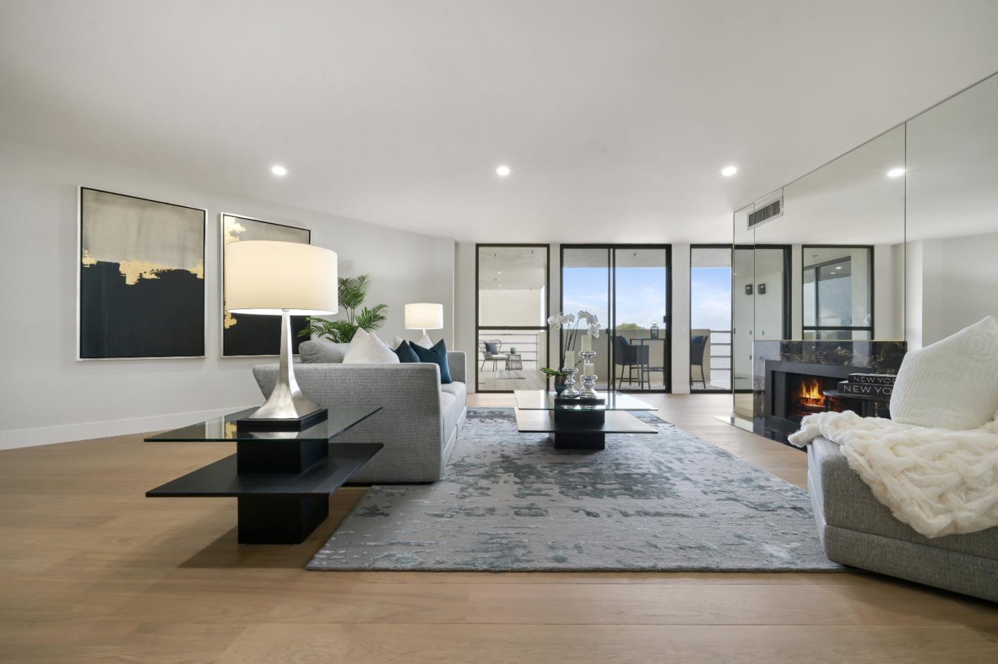 110 Park Road, Unit 502 Burlingame, CA 94010 - Photo 5 of 43 a living room with furniture and a large window