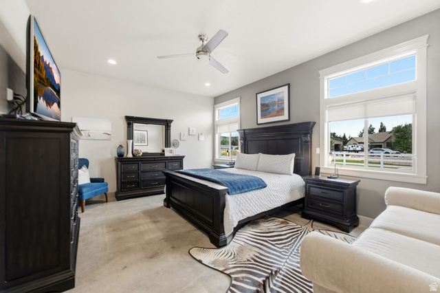 560 Aspen Road Francis, UT 84036 - Photo 24 of 59 Vaulted ceiling with a ceiling fan, recessed lighting, and multiple windows with white trim