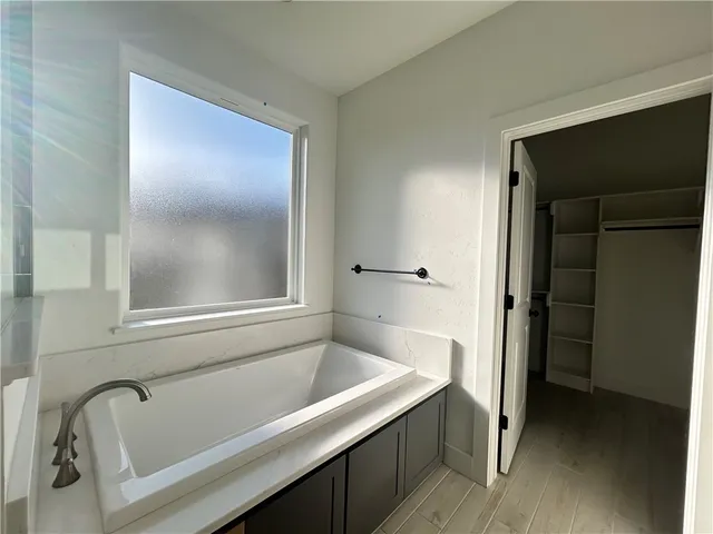 a bathroom with a bathtub
