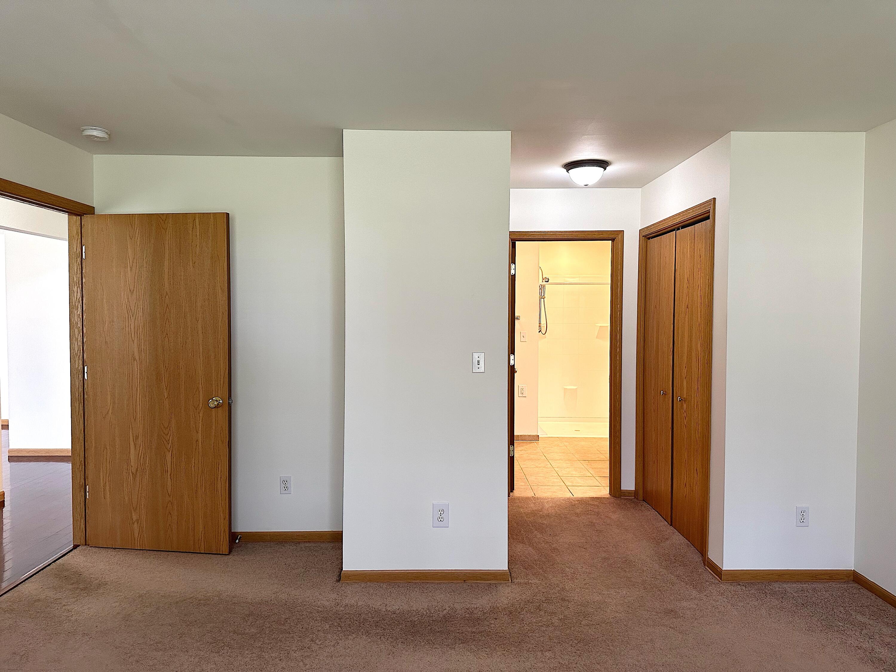 482 Fox Lane Walworth, WI 53184 - Photo 14 of 20 The primary suite has its own spacious bath and double closets