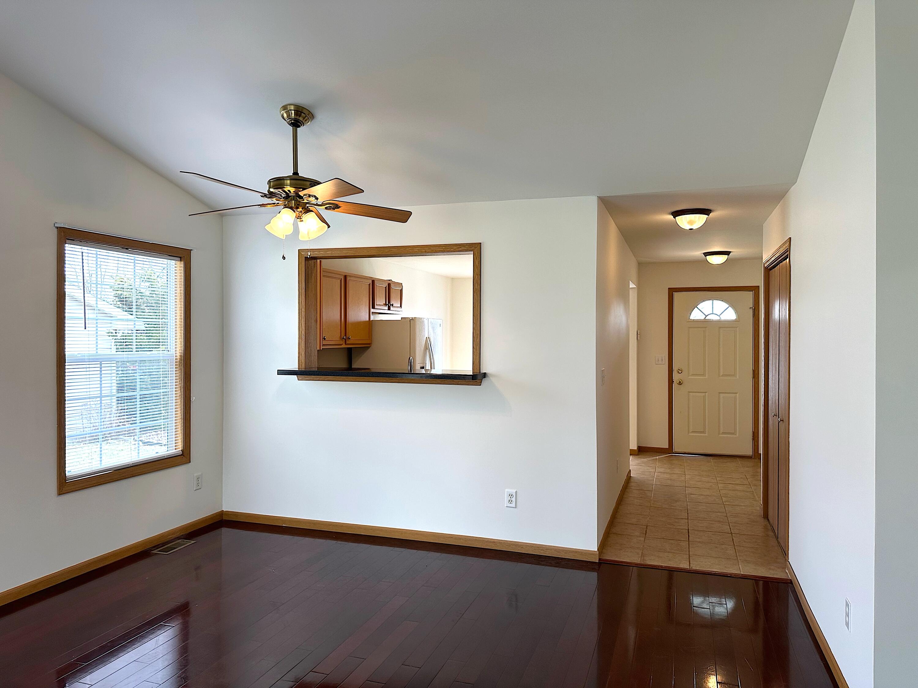 482 Fox Lane Walworth, WI 53184 - Photo 9 of 20 The kitchen and dining area are just off the entry but the Great Room has an excellent spot for a dining table as well as space at the breakfast/serving bar for bar stools