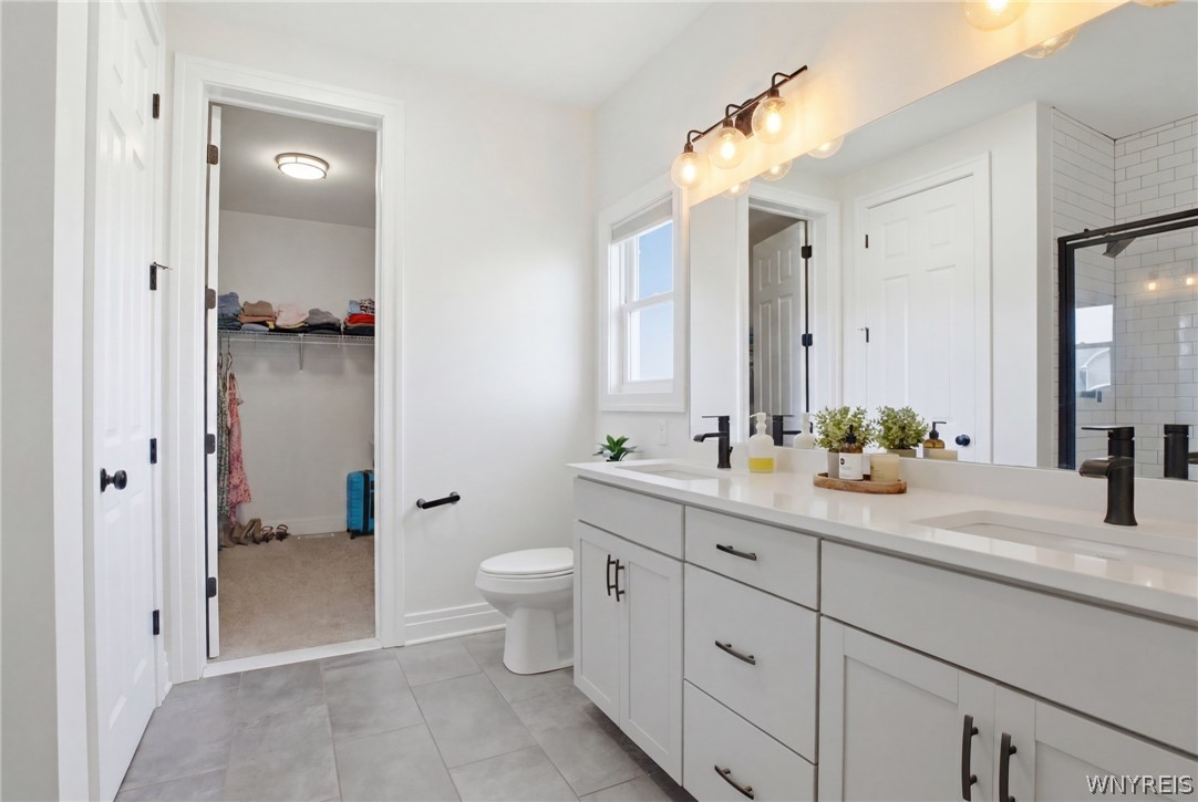 5561 Cooper Ridge Hamburg, NY 14075 - Photo 16 of 50 Primary bedroom ensuite bathroom on the first floo