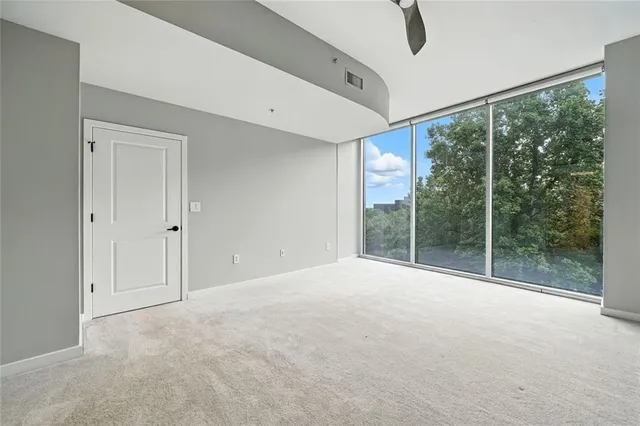 a view of a room with a large window