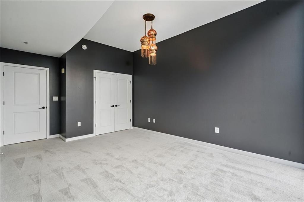 3300 Windy Ridge Parkway Southeast, Unit 711 Atlanta, GA 30339 - Photo 20 of 37 a view of an empty room with a window