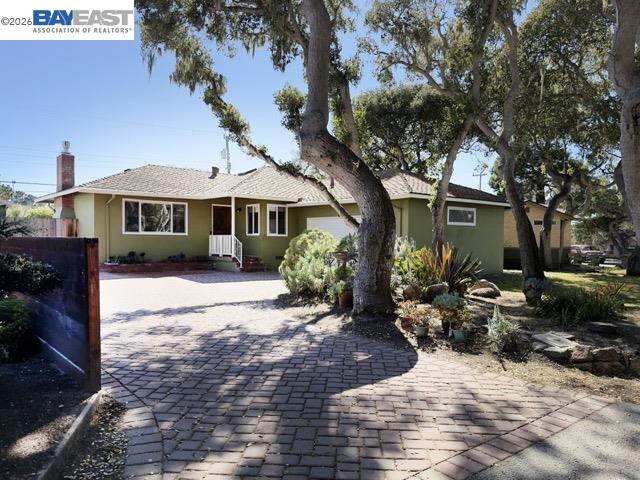 743 Marino Pines Road Pacific Grove, CA 93950 - Photo 1 of 28 a front view of a house with garden