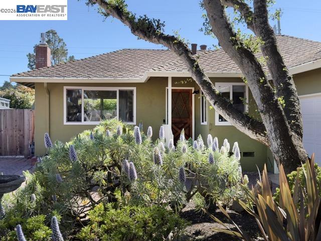 743 Marino Pines Road Pacific Grove, CA 93950 - Photo 2 of 28 front view of a house with a lot of potted plants