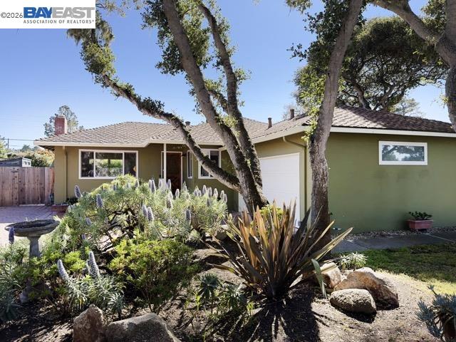 743 Marino Pines Road Pacific Grove, CA 93950 - Photo 3 of 28 a front view of a house with a yard