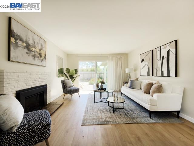 743 Marino Pines Road Pacific Grove, CA 93950 - Photo 4 of 28 a living room with furniture and a fireplace