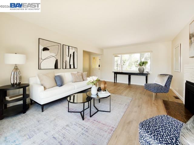 743 Marino Pines Road Pacific Grove, CA 93950 - Photo 5 of 28 a living room with furniture and a rug