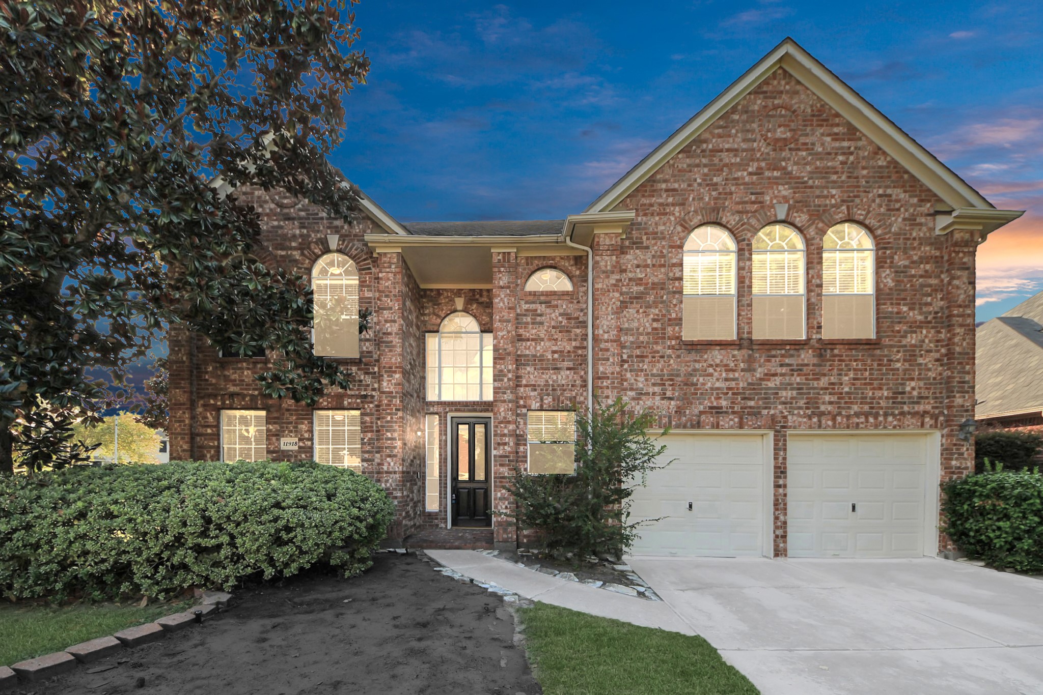 11918 Helene Court Pinehurst, TX 77362 - Photo 1 of 50 a front view of a house