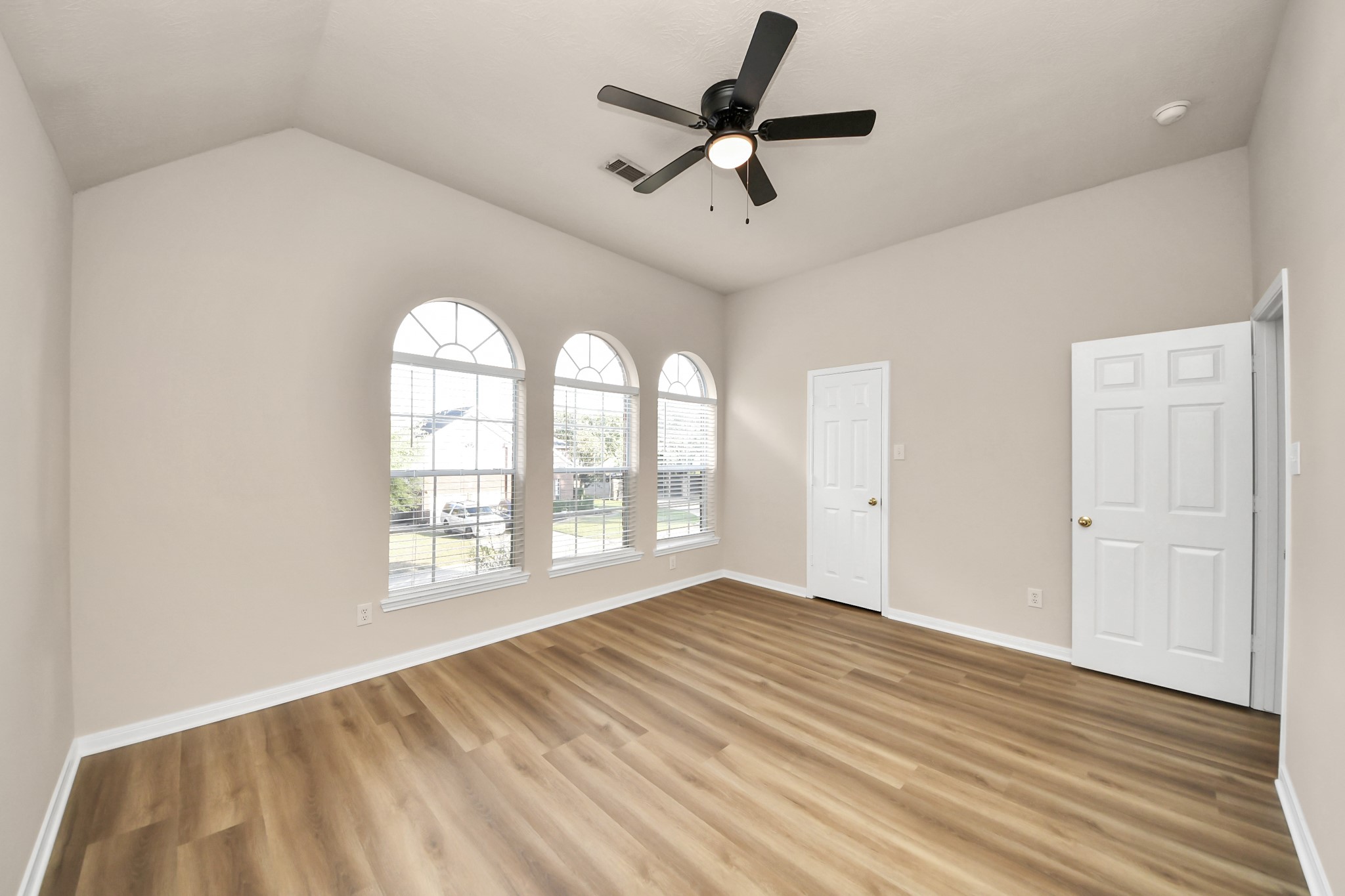 11918 Helene Court Pinehurst, TX 77362 - Photo 36 of 50 a view of empty room with wooden floor and fan
