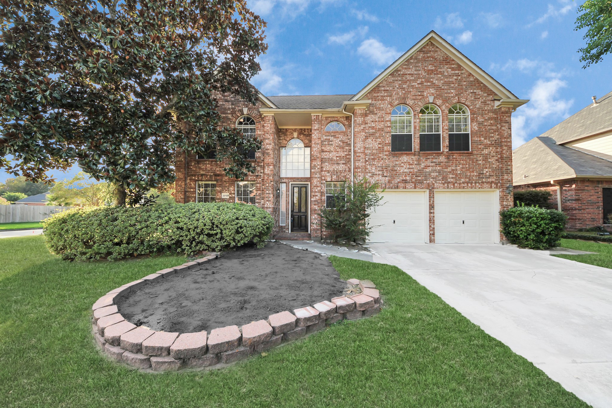 11918 Helene Court Pinehurst, TX 77362 - Photo 45 of 50 a front view of a house with a yard