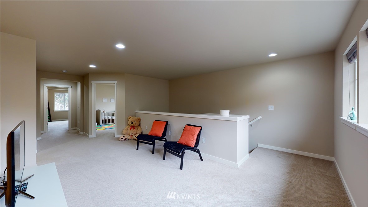 29 175th Place Southeast Bothell, WA 98012 - Photo 12 of 19 a view of a livingroom with furniture and windows