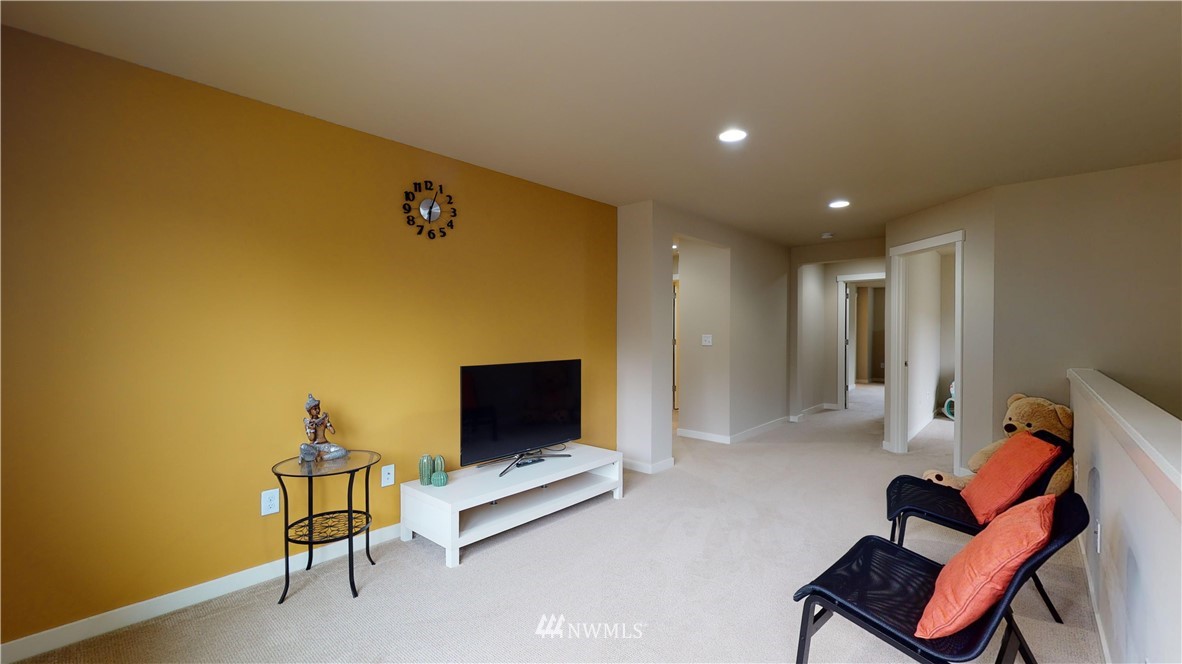 29 175th Place Southeast Bothell, WA 98012 - Photo 10 of 19 a living room with furniture and a flat screen tv