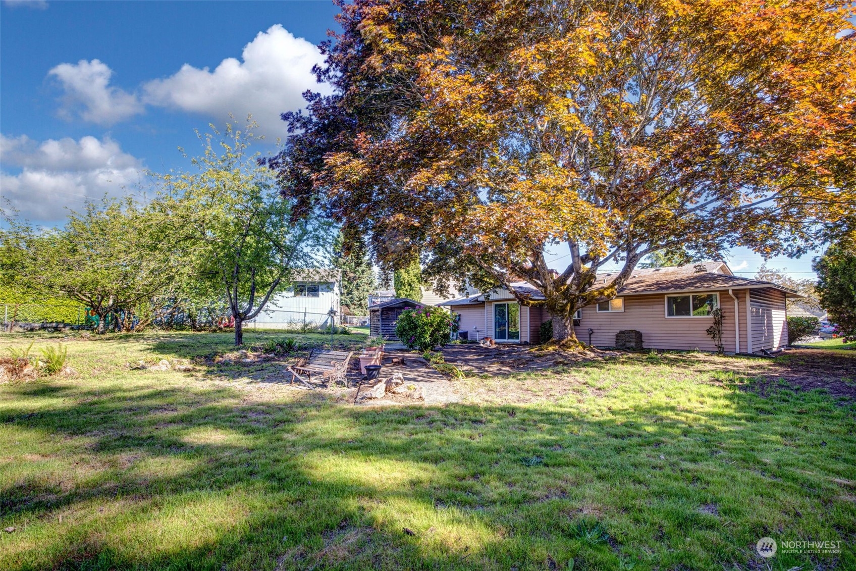 4109 Northeast 10th Place Renton, WA 98059 - Photo 25 of 27 a view of a house with a yard
