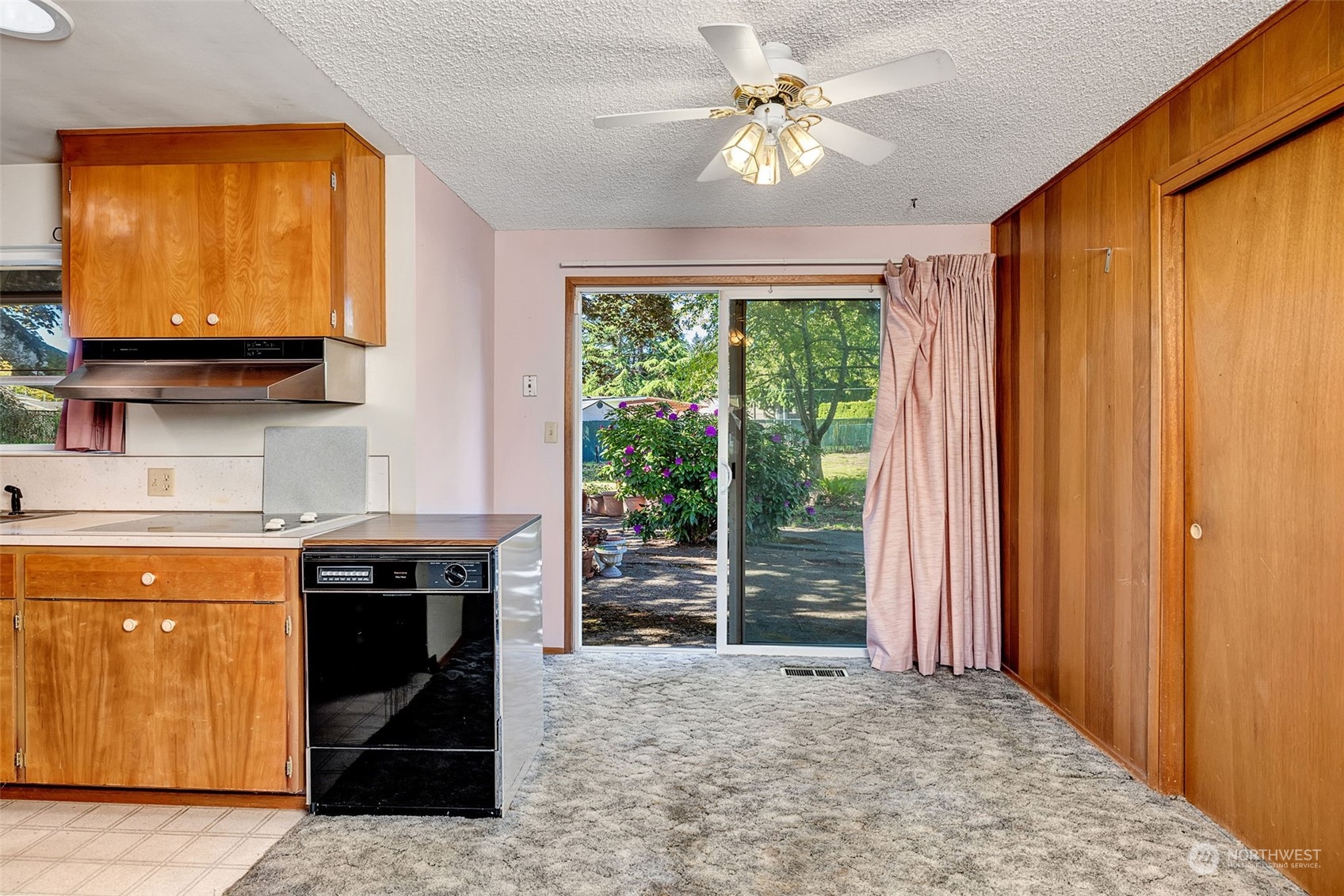 4109 Northeast 10th Place Renton, WA 98059 - Photo 9 of 27 a view of a kitchen with furniture fridge and a window
