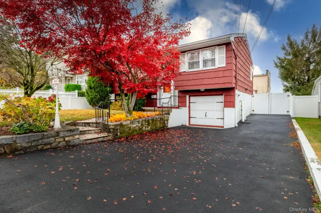 a house view with a backyard space