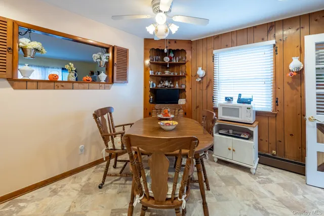 a view of a dining room with furniture