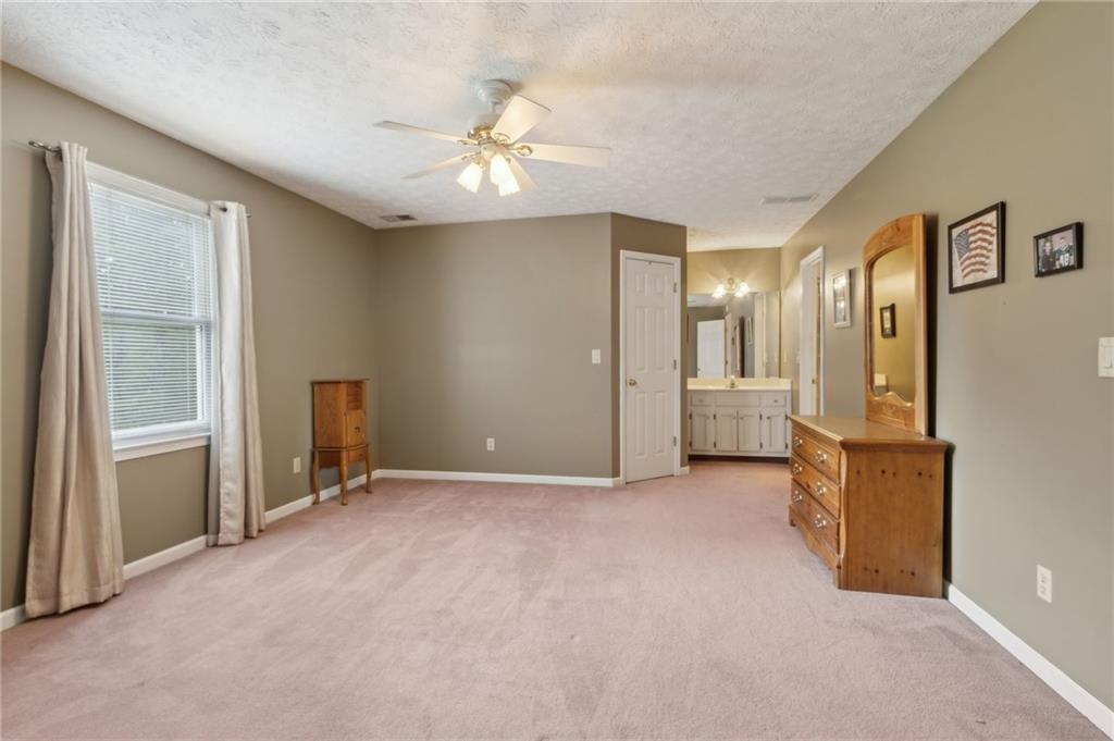 83 Russell Road Lawrenceville, GA 30043 - Photo 39 of 67 a view of an empty room with a mirror