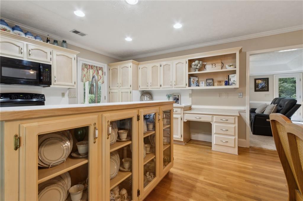 83 Russell Road Lawrenceville, GA 30043 - Photo 9 of 67 a kitchen with stainless steel appliances granite countertop a stove and a refrigerator