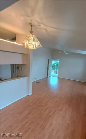 a view of a room with a window