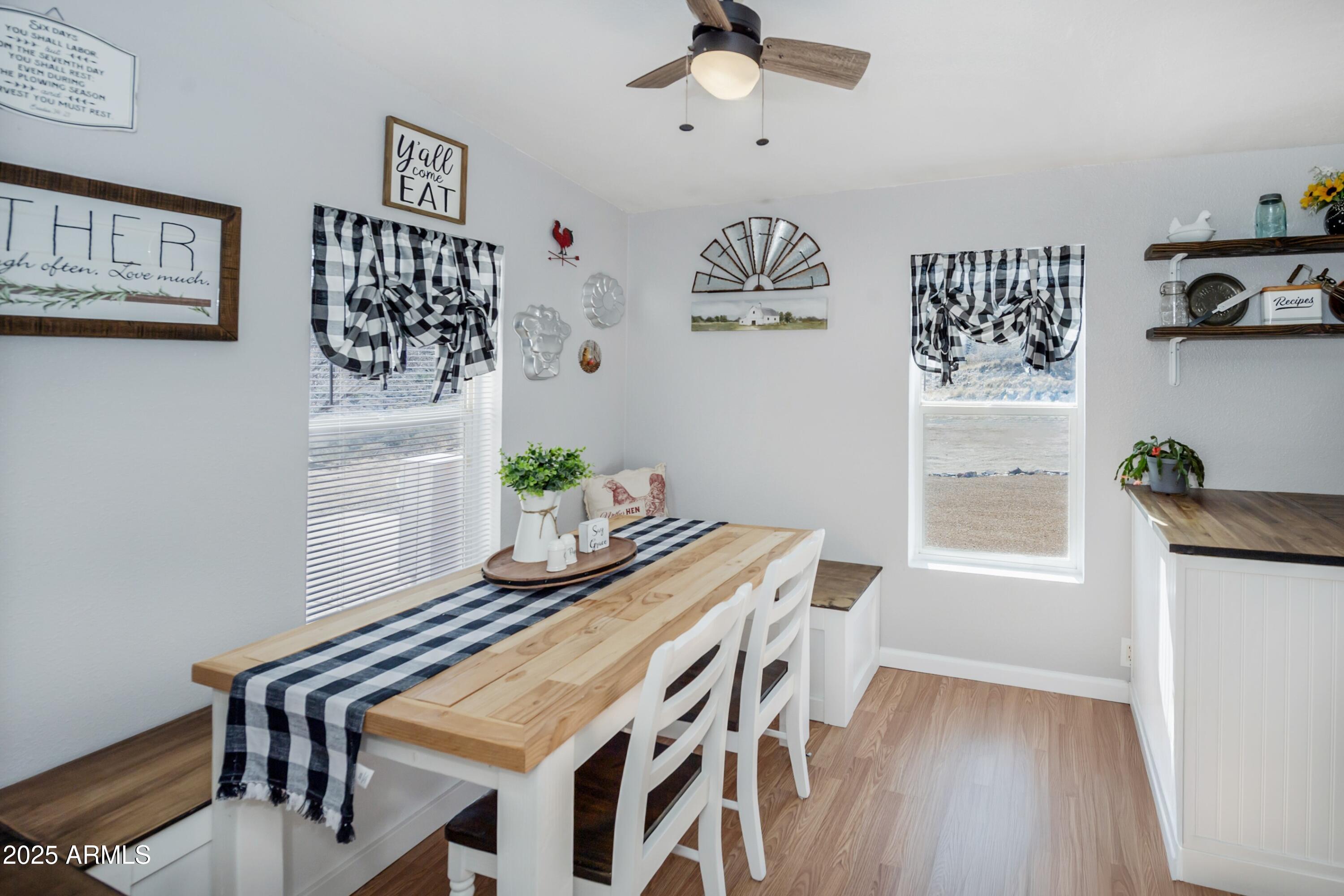 12320 Jacobs Road Mayer, AZ 86333 - Photo 13 of 37 a dining room with furniture and window