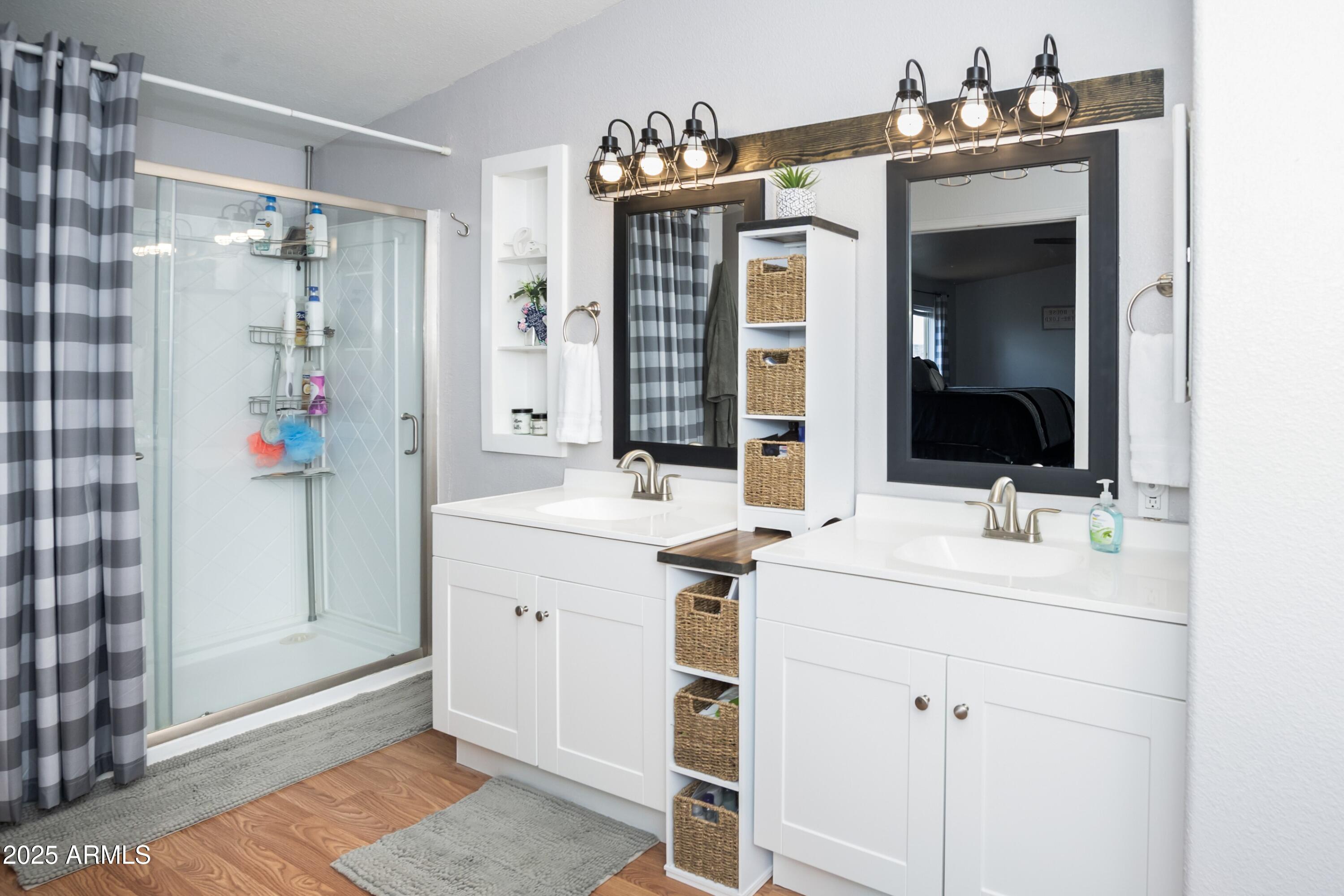 12320 Jacobs Road Mayer, AZ 86333 - Photo 16 of 37 a bathroom with a sink vanity and mirror