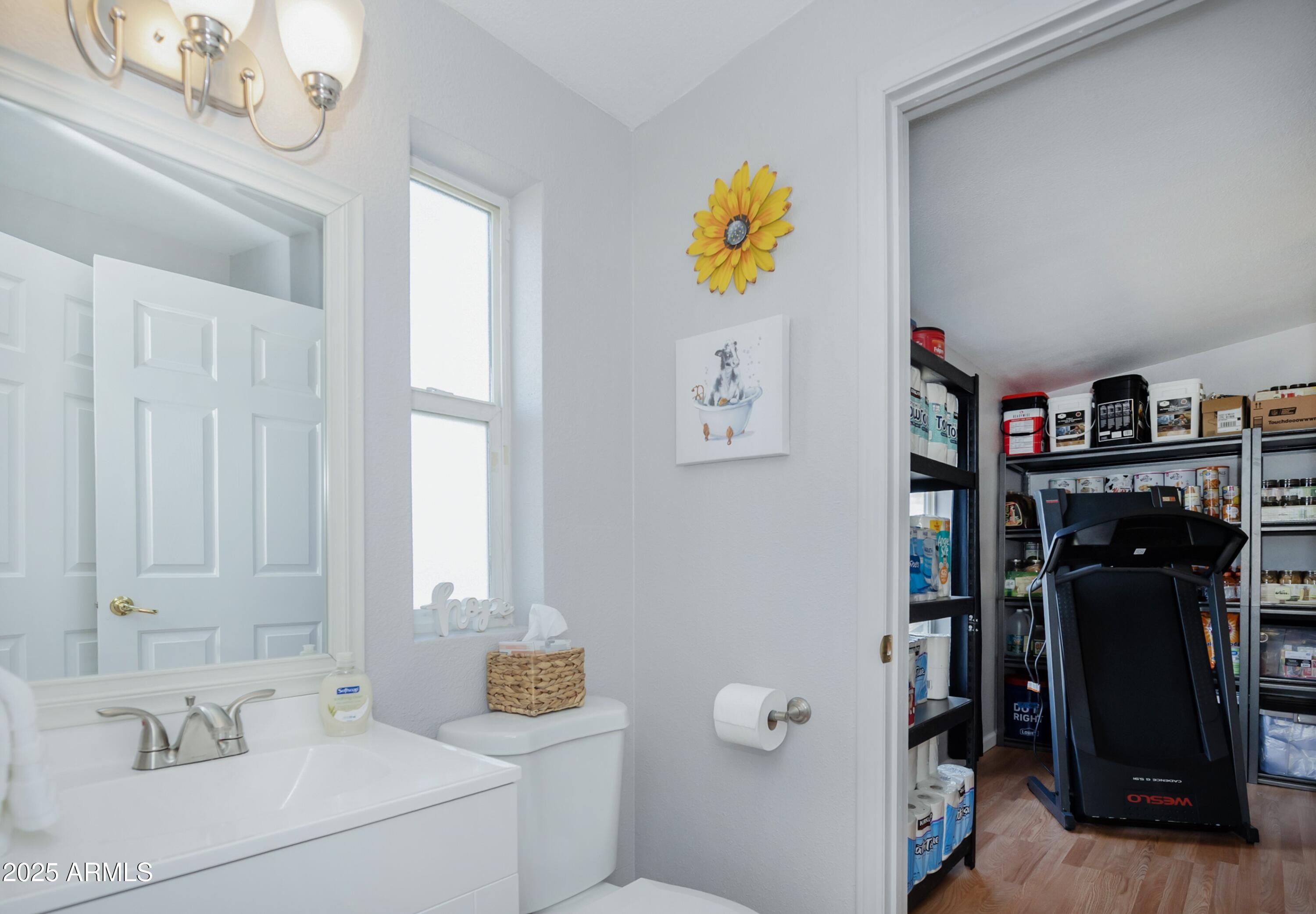 12320 Jacobs Road Mayer, AZ 86333 - Photo 24 of 37 a bathroom with a refrigerator and a sink