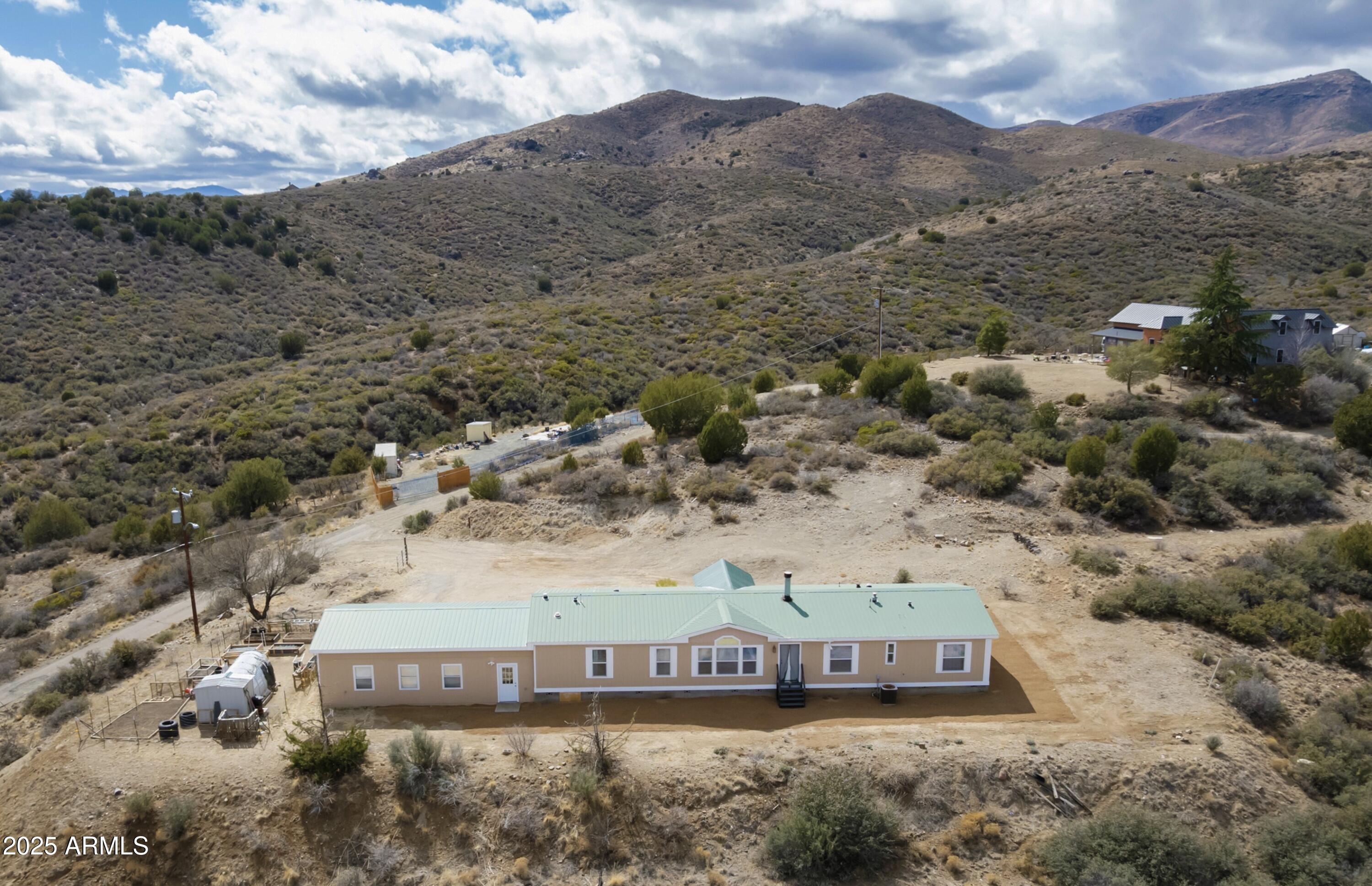 12320 Jacobs Road Mayer, AZ 86333 - Photo 33 of 37 a view of a road with mountains in the background