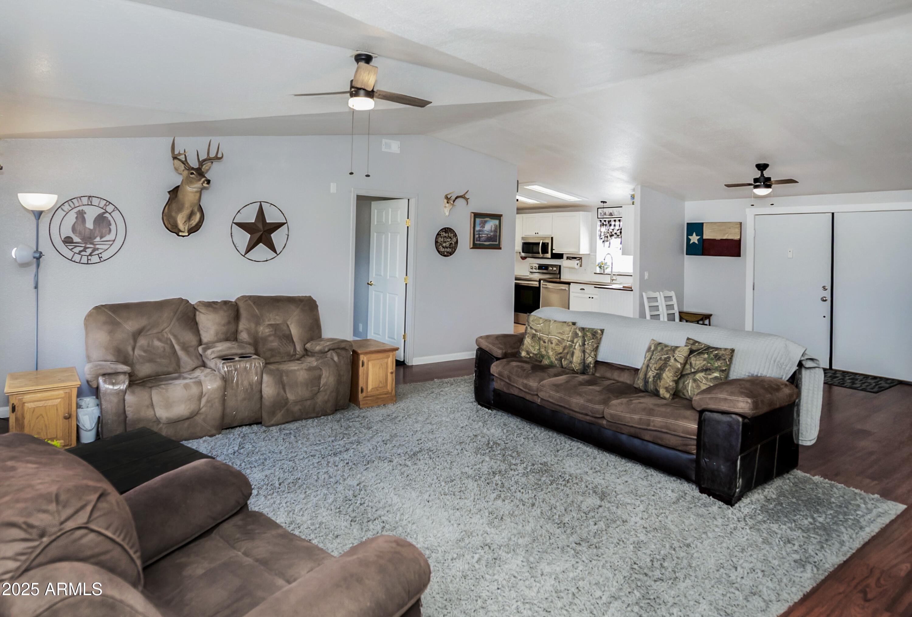 12320 Jacobs Road Mayer, AZ 86333 - Photo 6 of 37 a living room with furniture and a couch