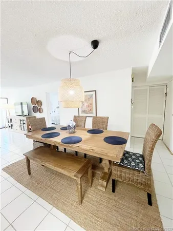 a living room with lots of furniture and a table