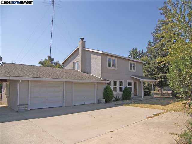 3078 Paradise Road Modesto, CA 95358 - Photo 1 of 1 a house view with a outdoor space