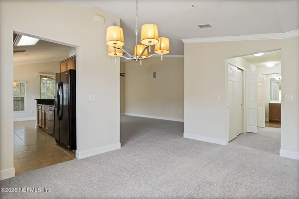 a view of a room with a large window