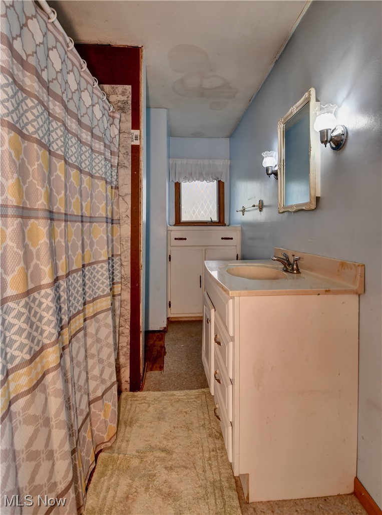 312 Hummel Valley Road Southwest New Philadelphia, OH 44663 - Photo 15 of 29 Bathroom featuring vanity