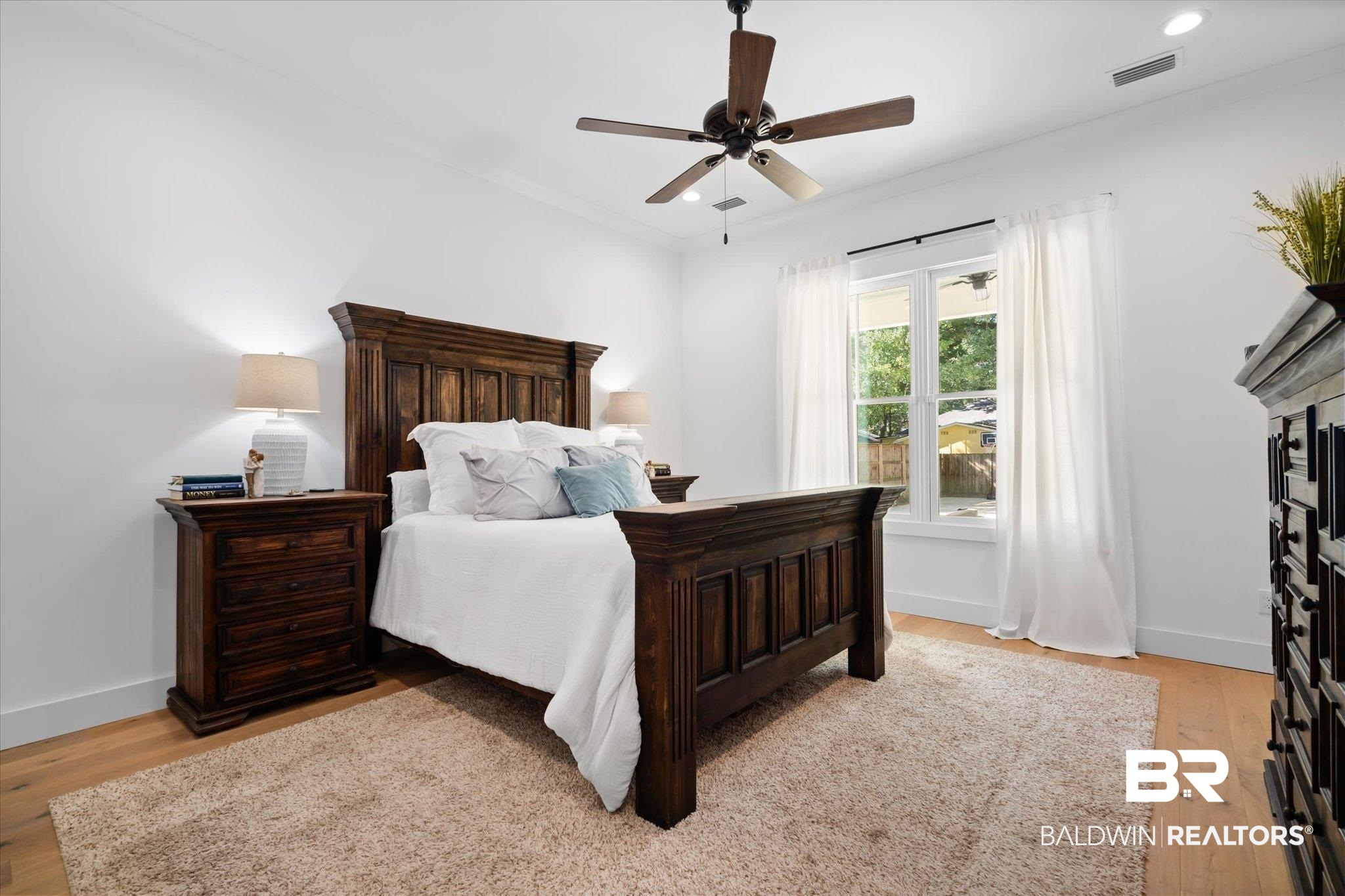 15 Semmes Avenue Mobile, AL 36604 - Photo 12 of 43 Bedroom featuring light hardwood / wood-style floors, ceiling fan, and crown molding