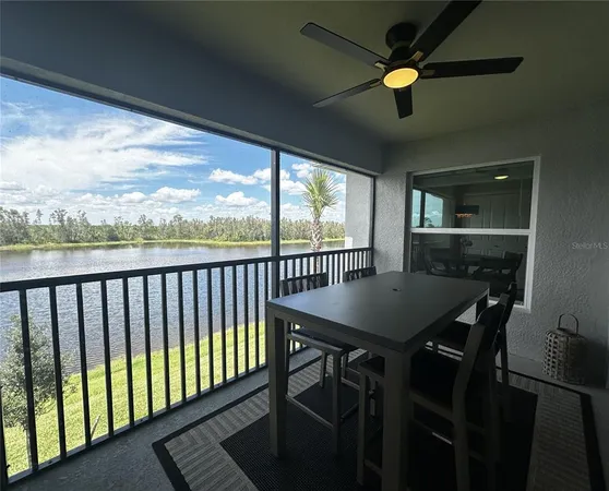 a view of a balcony dining area