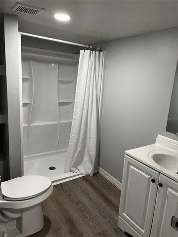 a bathroom with a sink and a toilet