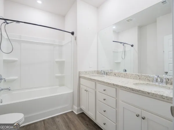 a view of a room with racks on the wall