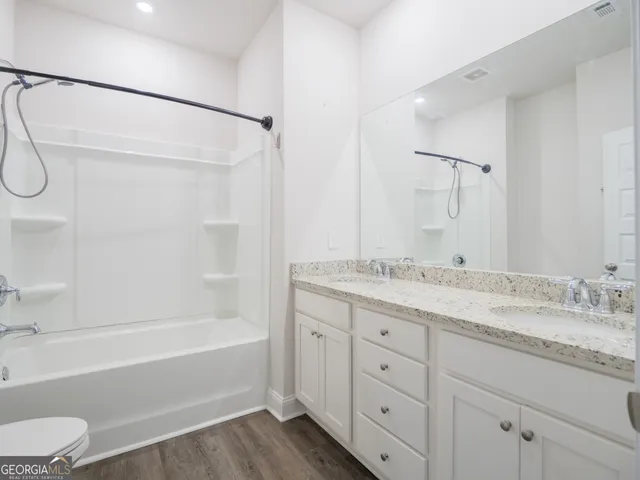 a view of a room with racks on the wall