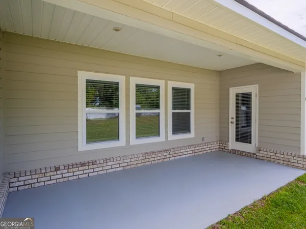 a view of a swimming pool with a garden