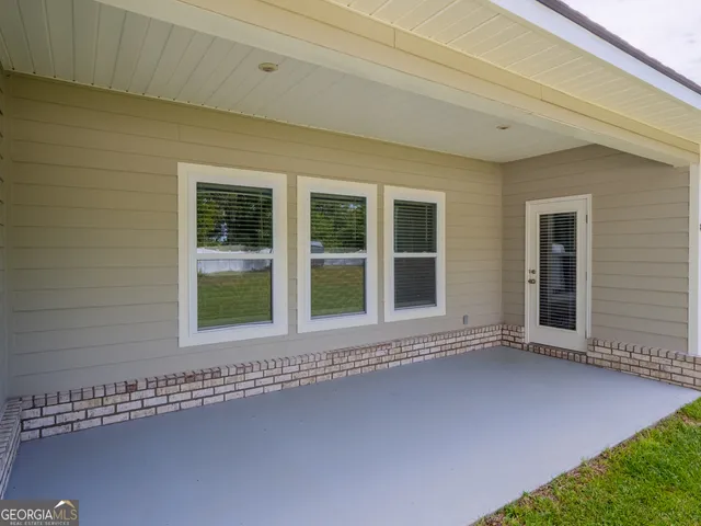 a view of a swimming pool with a garden