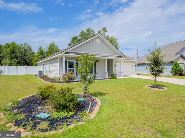 a front view of a house with swimming pool