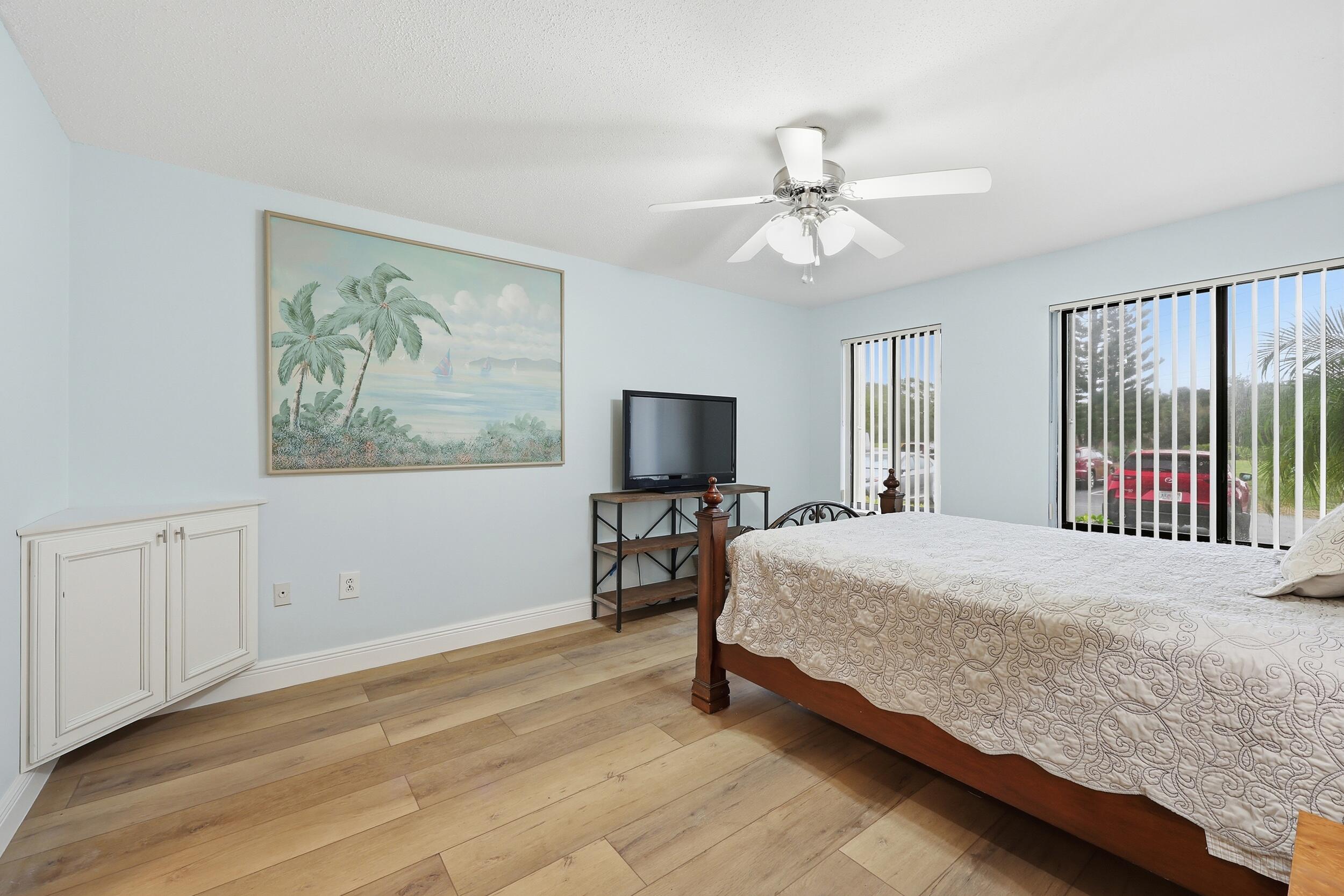 5111 Southeast Miles Grant Road, Unit 102 Stuart, FL 34997 - Photo 17 of 30 Primary Suite